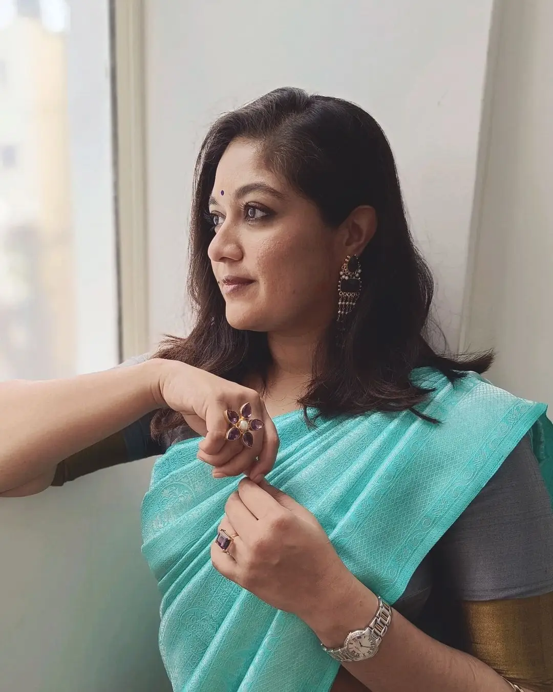 Actress Meghana Raj Wearing Beautiful Earring Blue Saree